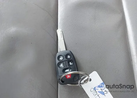 2012 Honda Odyssey Ex-L z USA, uszkodzony, nr VIN 5FNRL5H61CB074425